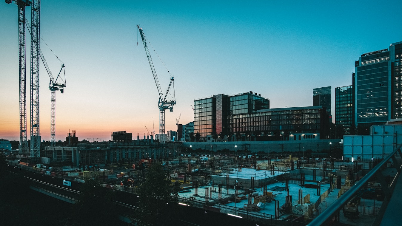 Construction site with cranes and buildings